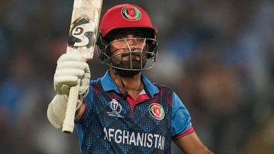 Afghanistan's captain Hashimatullah Shahidi celebrates his fifty runs against Sri Lanka in Pune