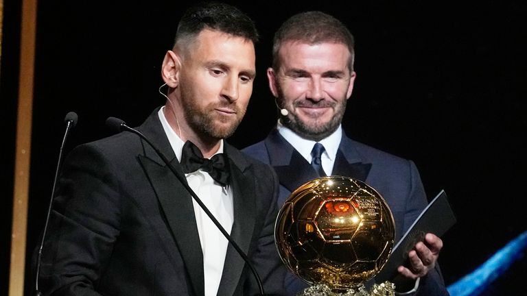Inter Miami team co-owner and former soccer star David Beckham, right, smiles as Inter Miami&#39;s and Argentina&#39;s national team player Lionel Messi receives the 2023 Ballon d&#39;Or trophy from during the 67th Ballon d&#39;Or (Golden Ball) award ceremony at Theatre du Chatelet in Paris, France, Monday, Oct. 30, 2023. (AP Photo/Michel Euler)